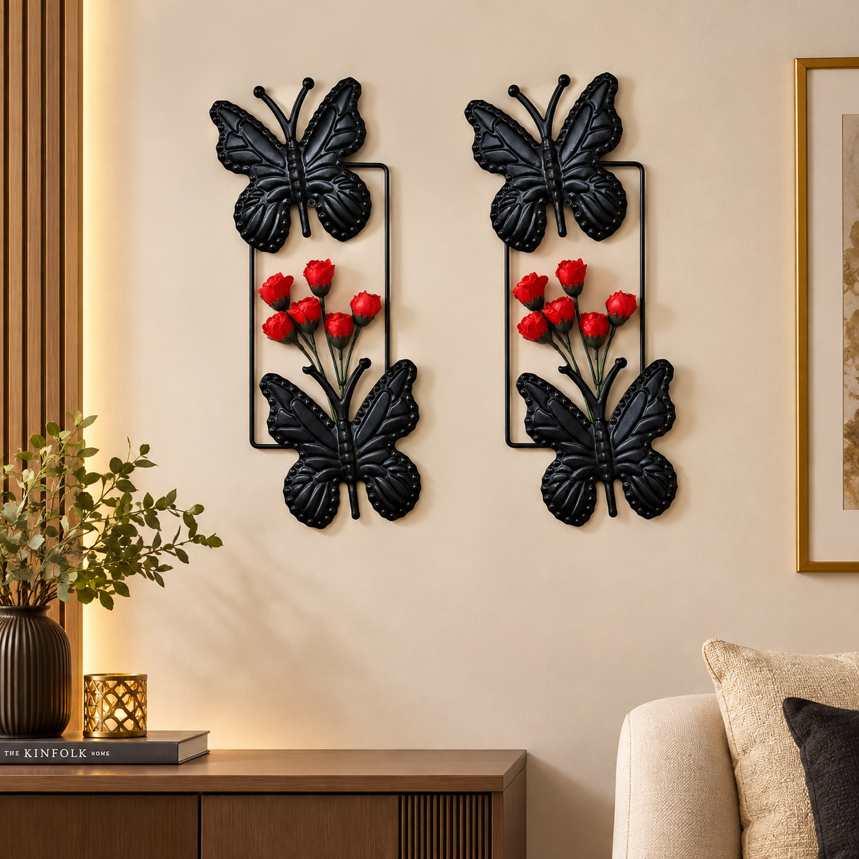Black metallic wall hanging featuring two graceful butterflies with a cluster of vibrant Red Rosebuds