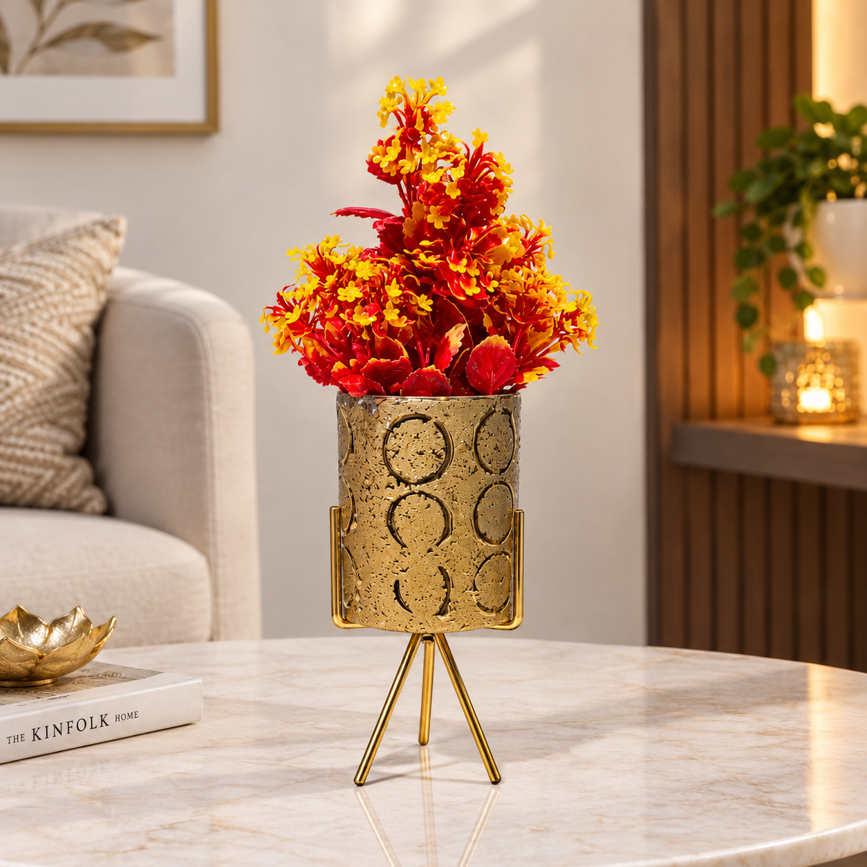 Golden Ceramic Pot with Artificial Red-Yellow Plant on a Golden Metallic Tripod Stand