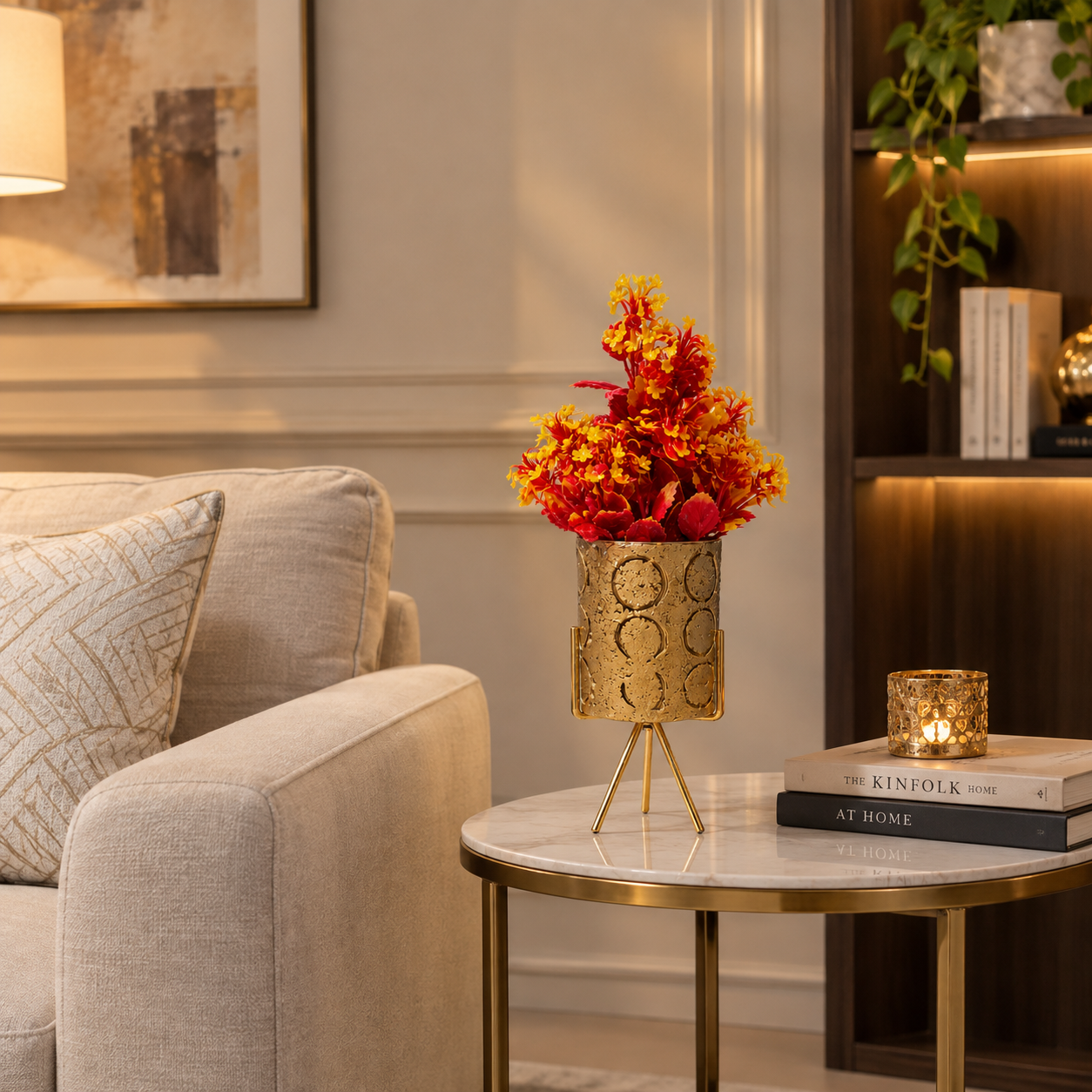 Golden Ceramic Pot with Artificial Red-Yellow Plant on a Golden Metallic Tripod Stand