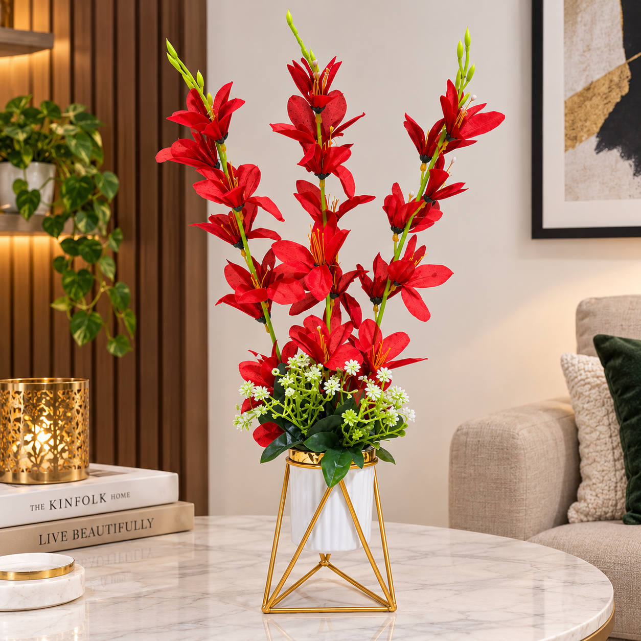Artificial Red Gladiolus flower arrangement in a geometric golden metallic stand with a white pot