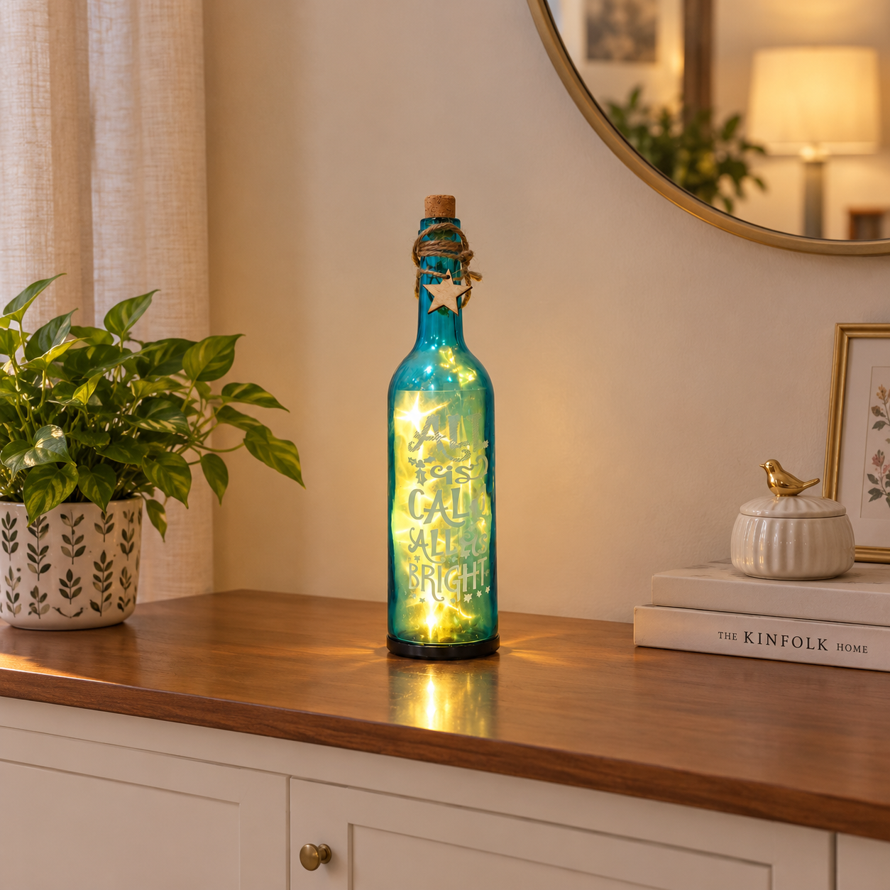 Blue Glass Bottle with printed “All is Calm - All is Bright” with LED Starry String Lights inside