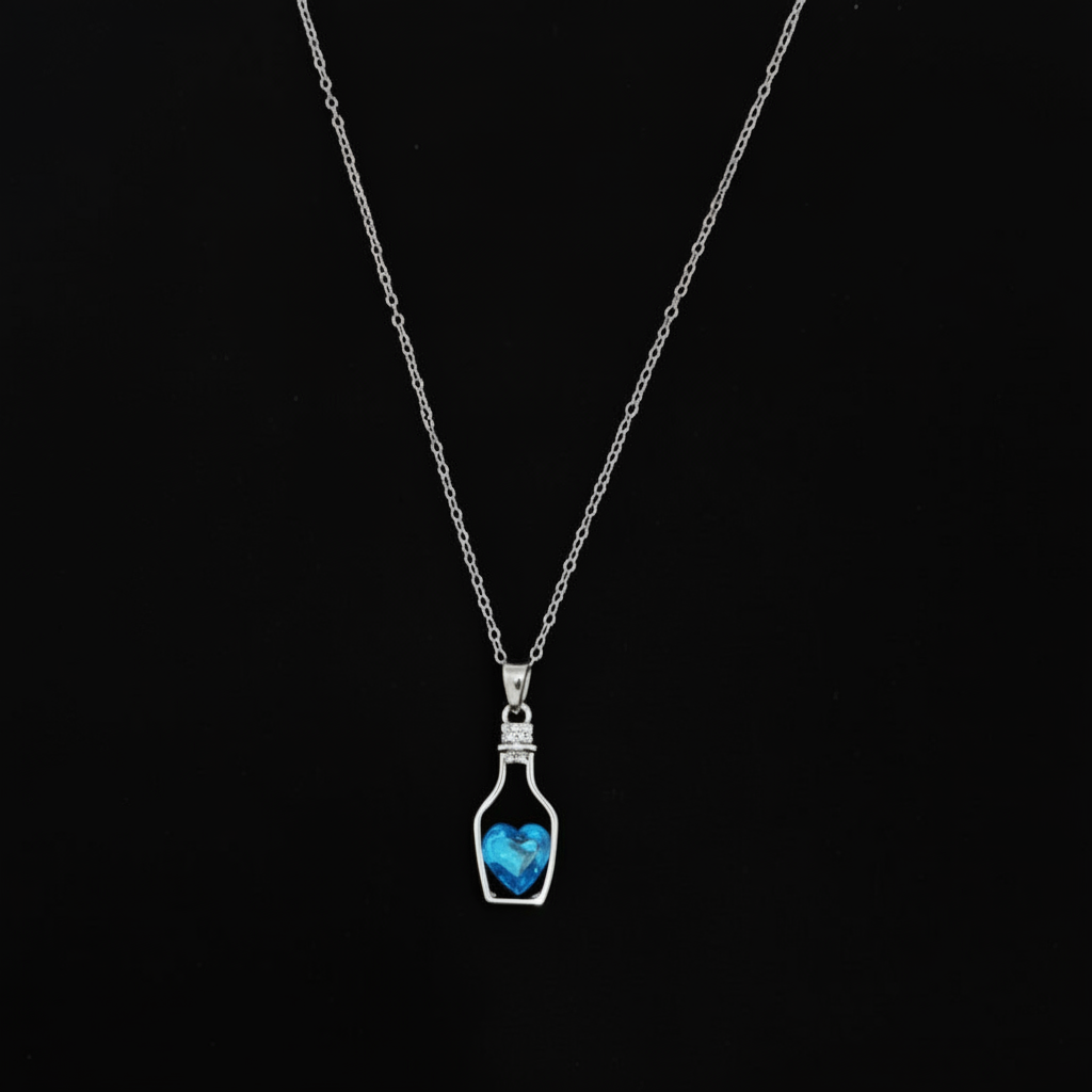 Aqua Crystal Heart in a Silver Hollow Drift Bottle Charm Locket in Gift Packing
