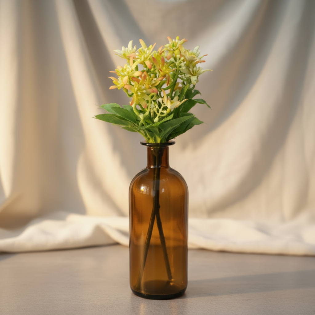 Brown Glass Bottle Vase with Bunch of Yellow Flowers