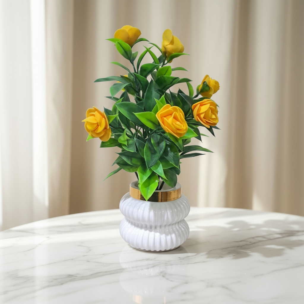 Yellow Camellia-Style Blossoms and lush green foliage in a white, ribbed Plastic Pot