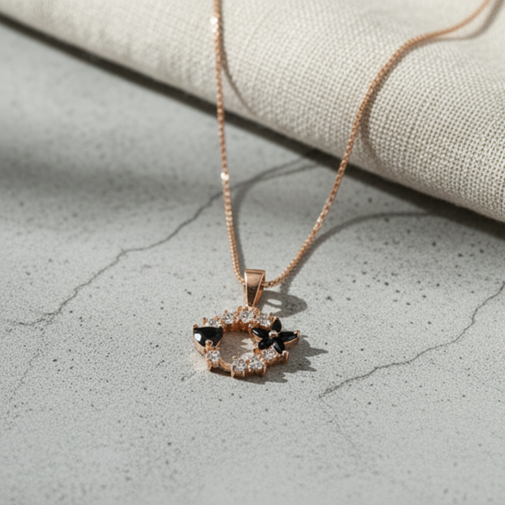 Golden with Black Heart & Flower shape Stones in Charm Locket in Gift Packing