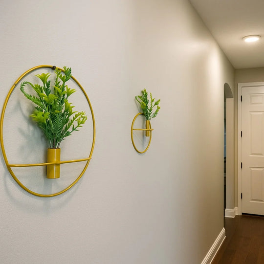 2 Metallic Planters with artificial Plants in Round Frames