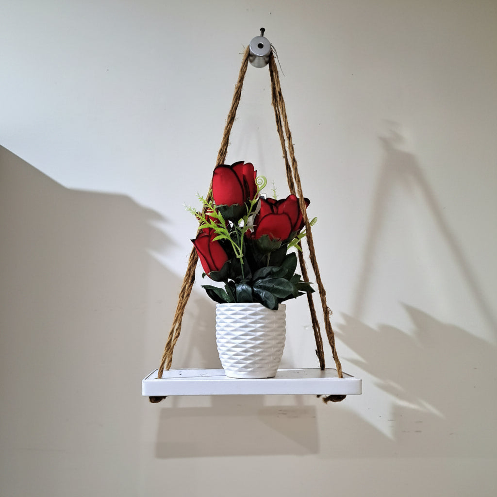 White Rope Hanging Shelf with Red Roses planted in White Plastic Planter