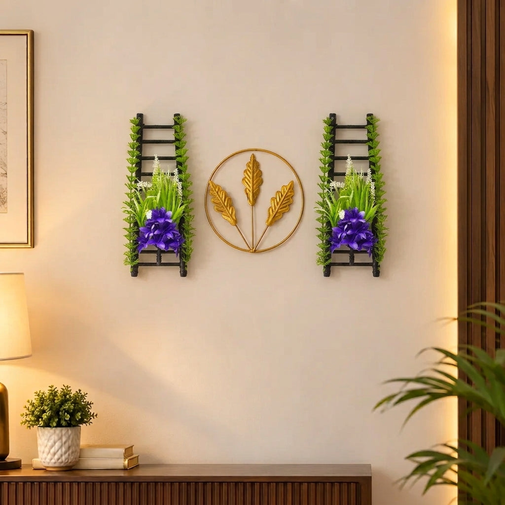 Golden Metallic Mini Round Wall hanging between 2 Black Ladders with artificial Lilac flowers & Green Foliage