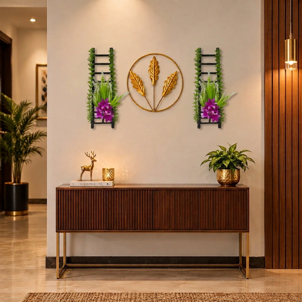 Golden Metallic Mini Round Wall hanging between 2 Black Ladders with artificial Purple flowers & Green Foliage