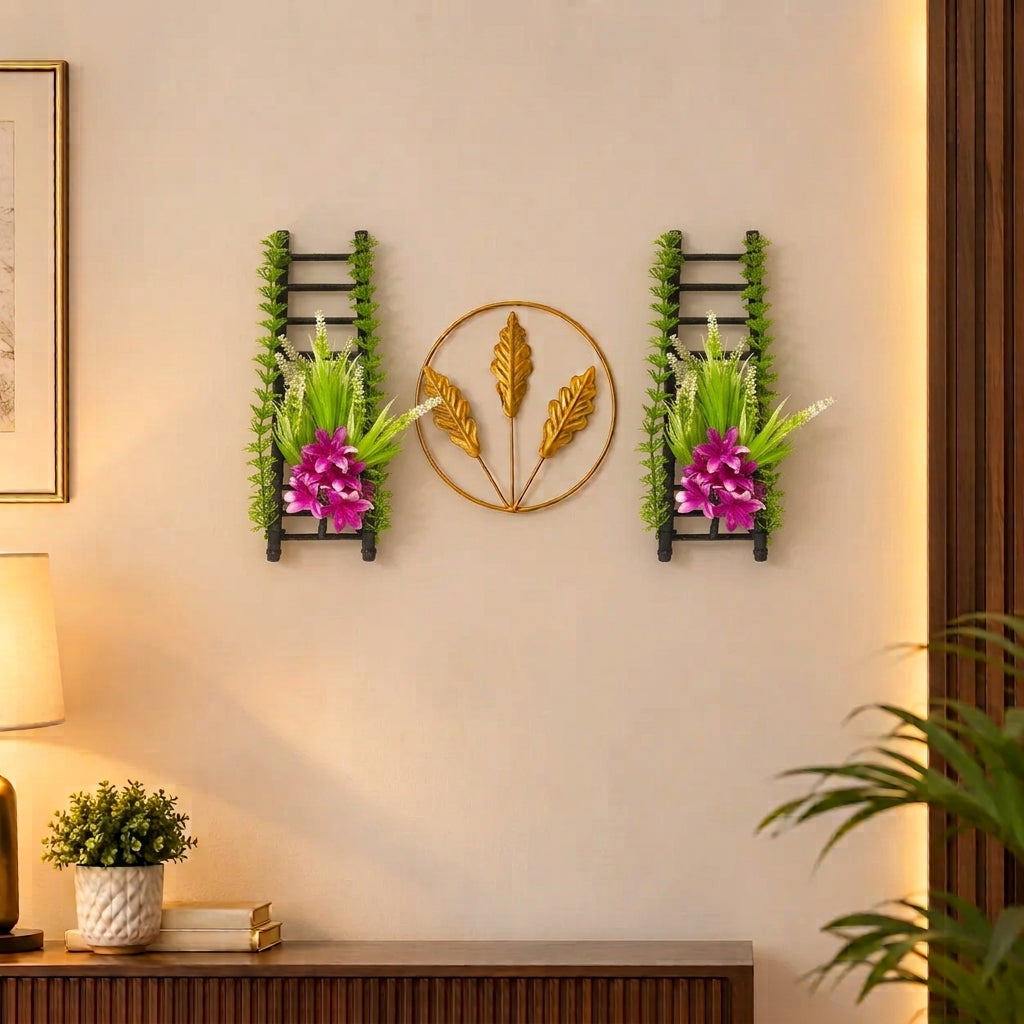 Golden Metallic Mini Round Wall hanging between 2 Black Ladders with artificial Purple flowers & Green Foliage