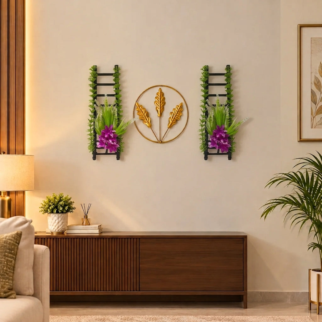 Golden Metallic Mini Round Wall hanging between 2 Black Ladders with artificial Purple flowers & Green Foliage