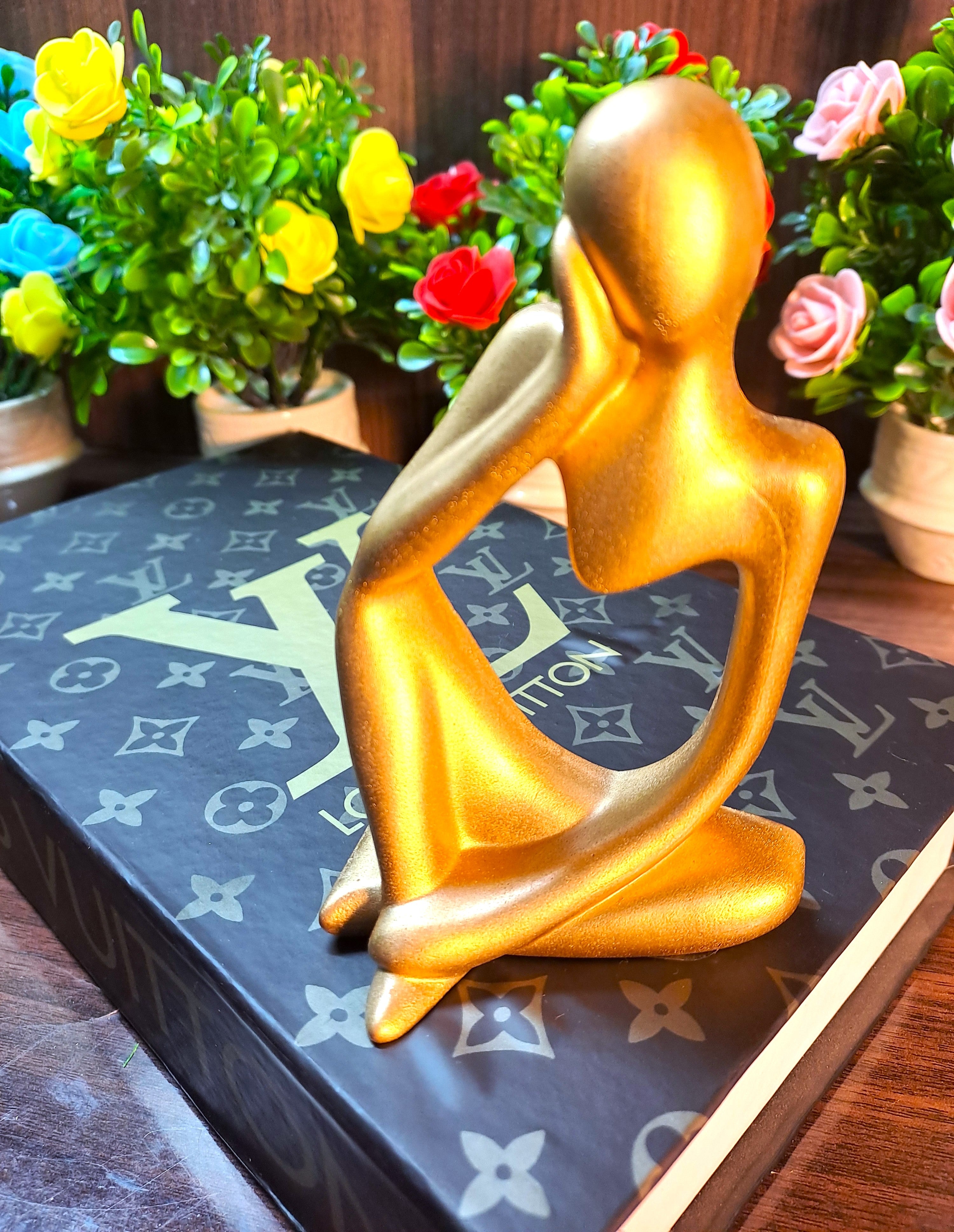 Golden Abstract Thinking Statue