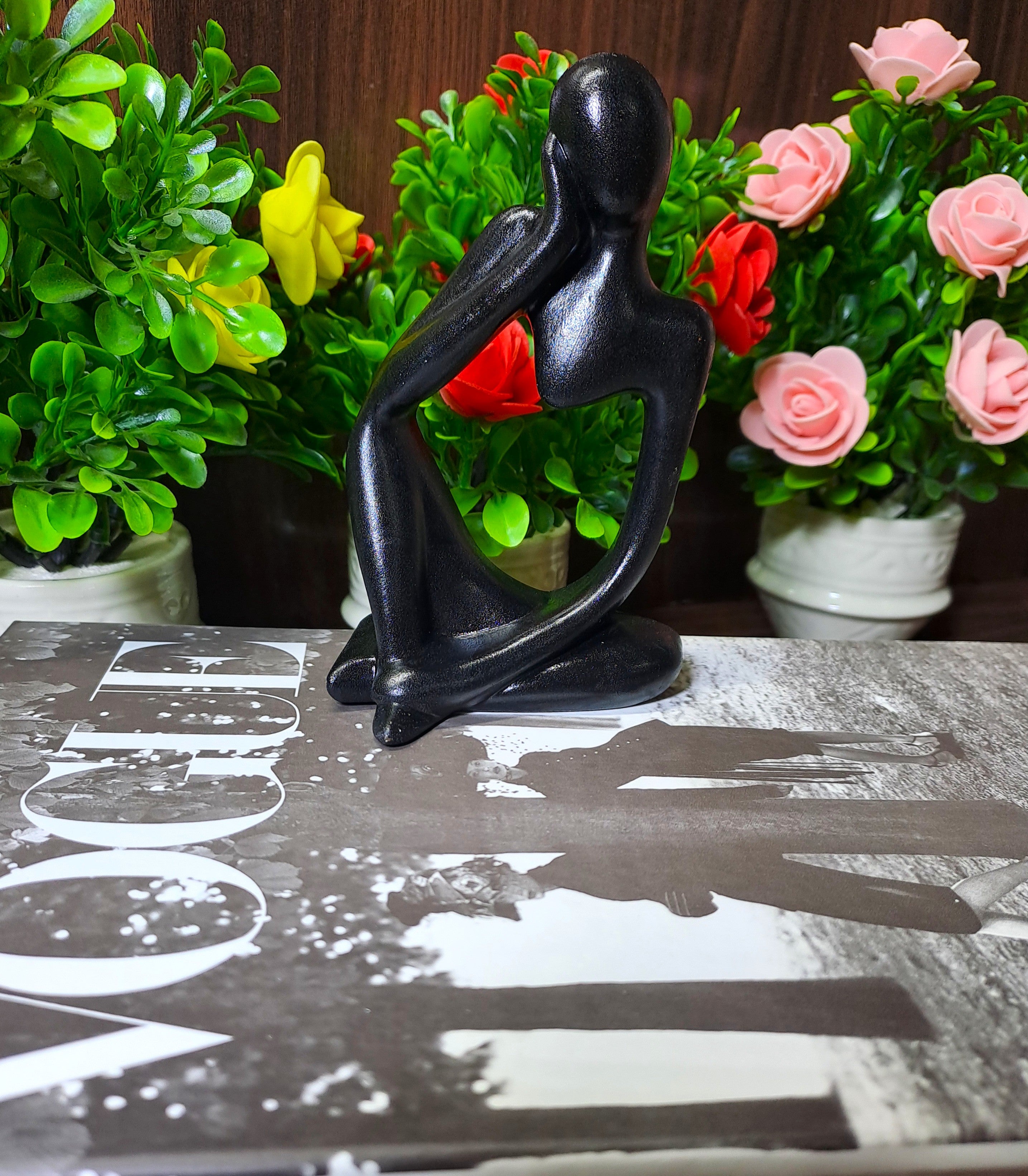 Black Abstract Thinking Statue