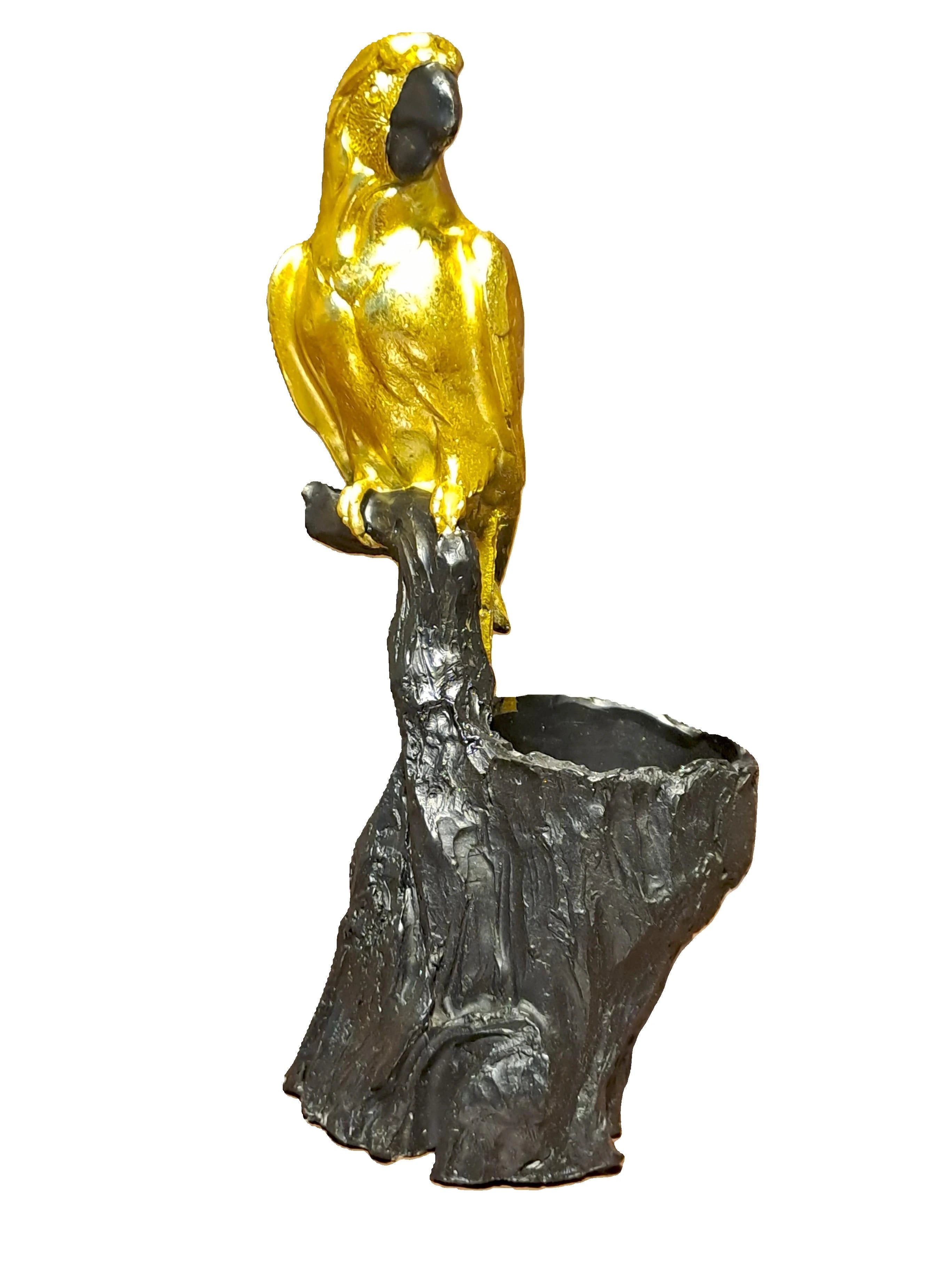 Golden Resin Parrot on Tree Stem