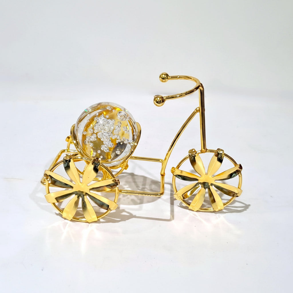 Crystal Ball on a Classic Golden metallic Tricycle