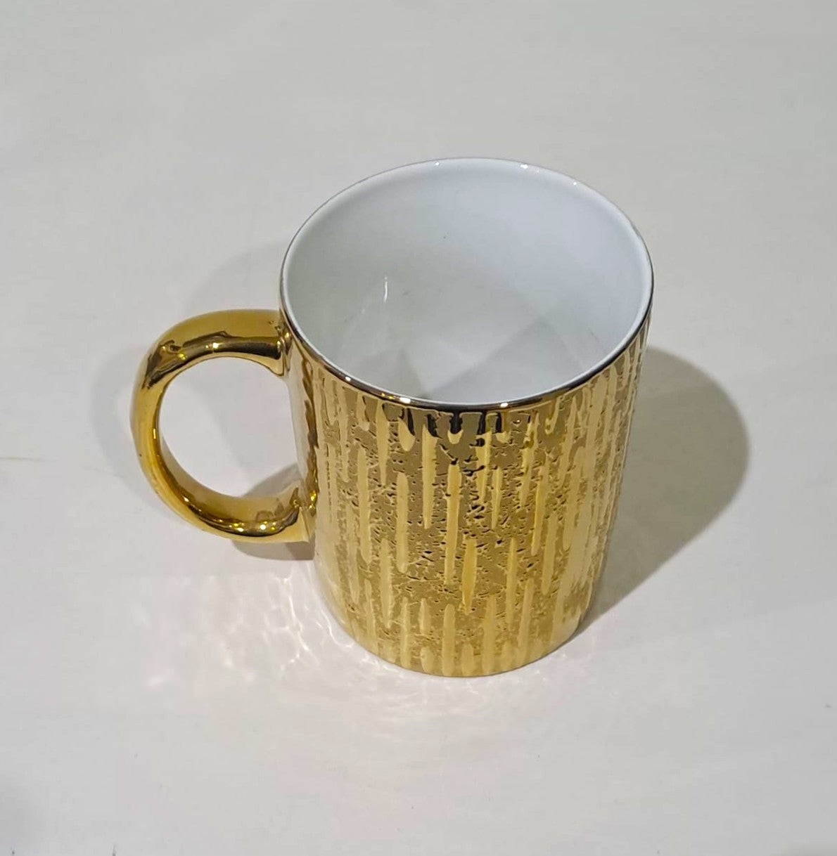 Golden Ceramics Coffee Mug with Textured Surroundings