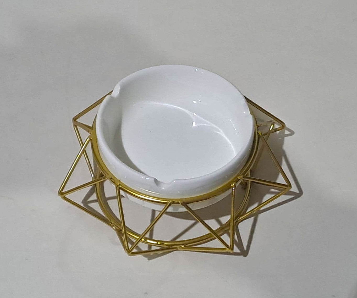 Ceramic Ashtray over a Golden Geometric Metal Stand