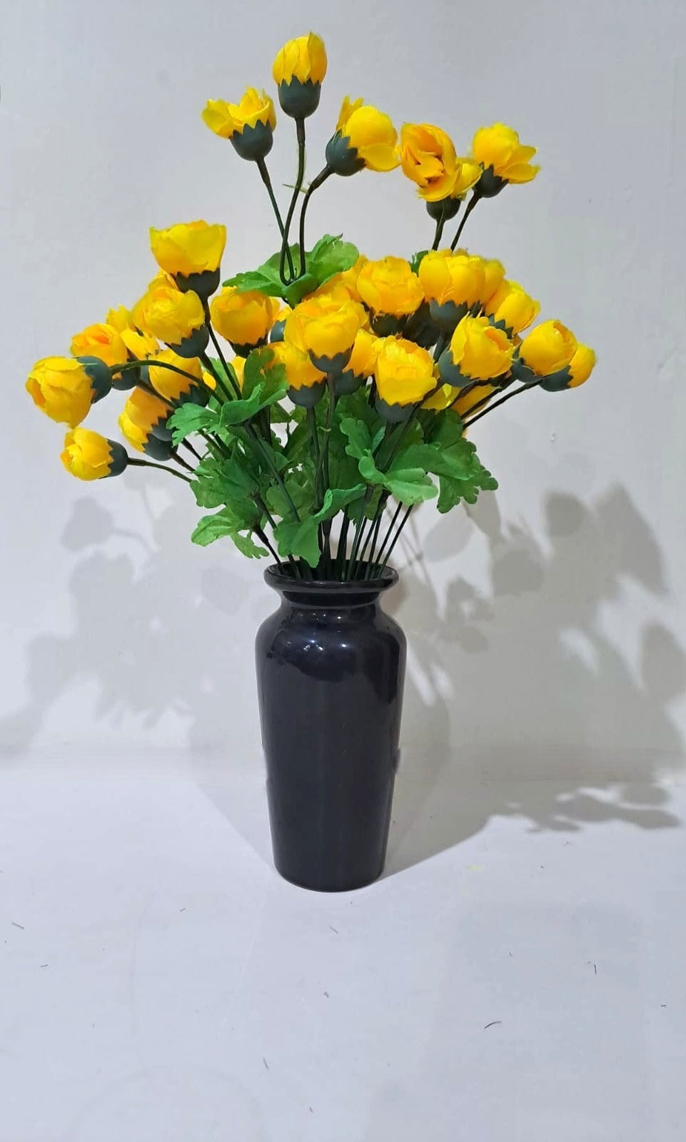 Black Classic Ceramic Vase with 2 Bunches of Yellow flowers