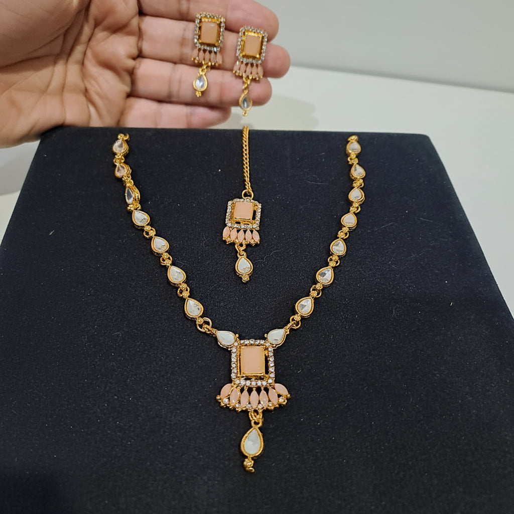 4-Pcs Set of Elegant Necklace, Earrings & Maang tika with Peach Crystal Beads in Gift Packing