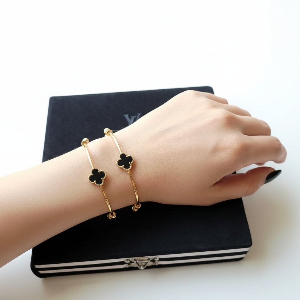 Pack of 2 Golden Bangles with Black Onyx Clovers and Heart Charms in Gift Packing