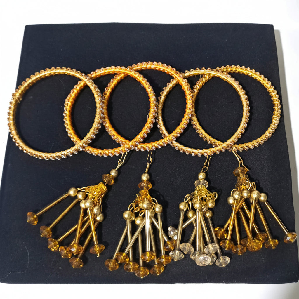 Pack of 5 Traditional Golden Bangles (4 with and 1 without Tassels) in Gift Packing