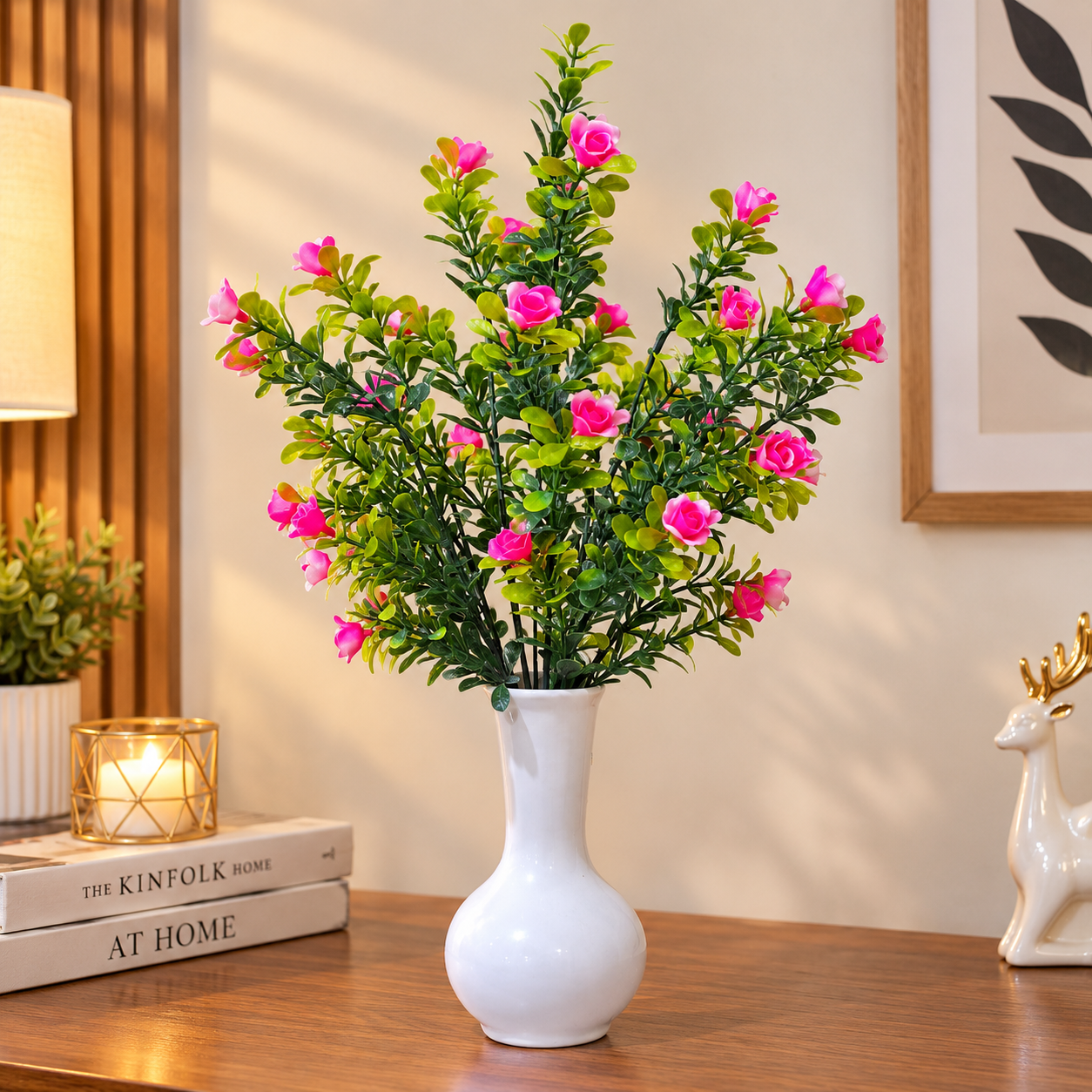 White Ceramic Pot with a Bunch of Plastic Plant leaves & Pink flowers