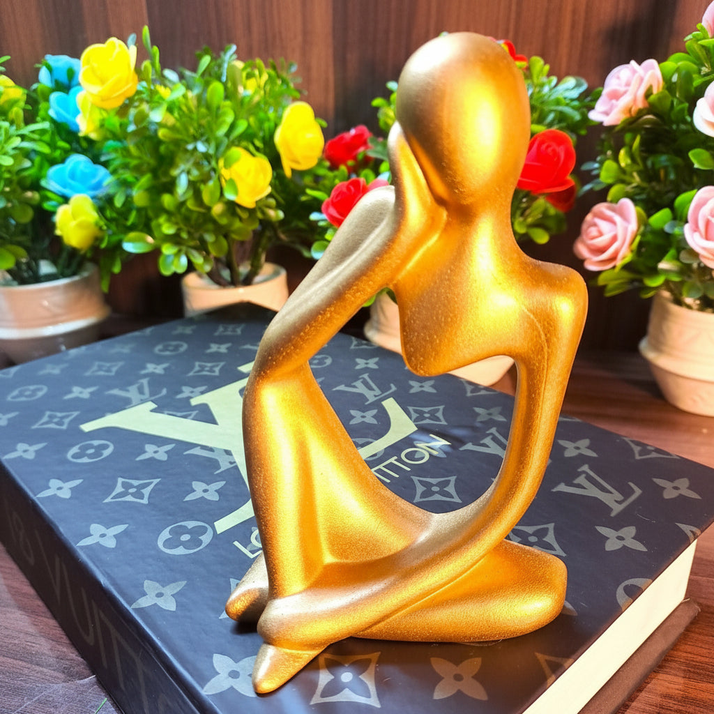Golden Abstract Thinking Statue