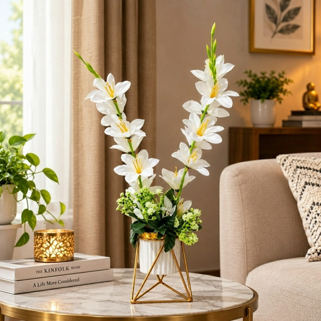 Artificial White Gladiolus flower arrangement in a geometric golden metallic stand with a white pot