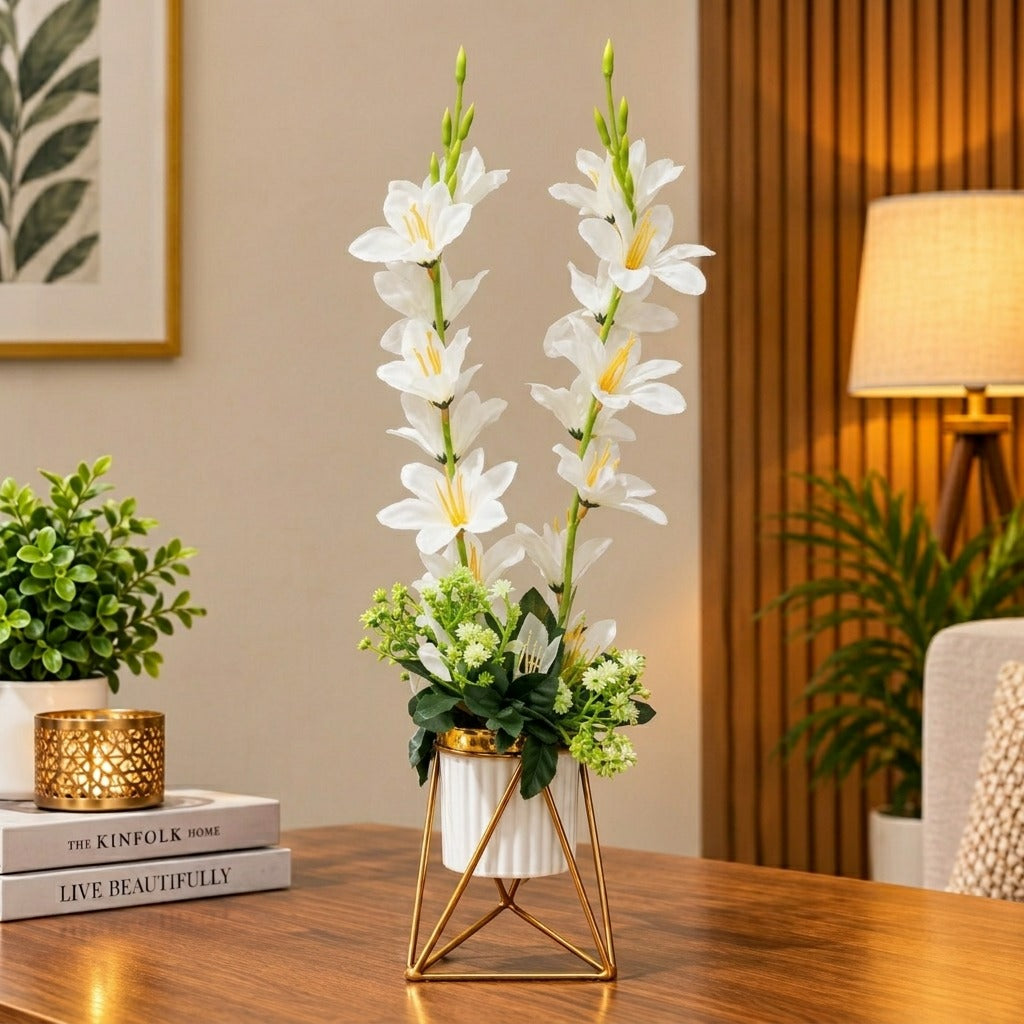 Artificial White Gladiolus flower arrangement in a geometric golden metallic stand with a white pot